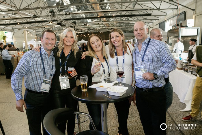 Candid group at Insurance Advisernet Australia Conference 2015 - Trade Show at Princes Wharf No 1 Shed. Photography by Paul Redding, Hobart Trade Show Photographer.